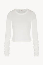 Éterne Long Sleeve Baby Tee-White