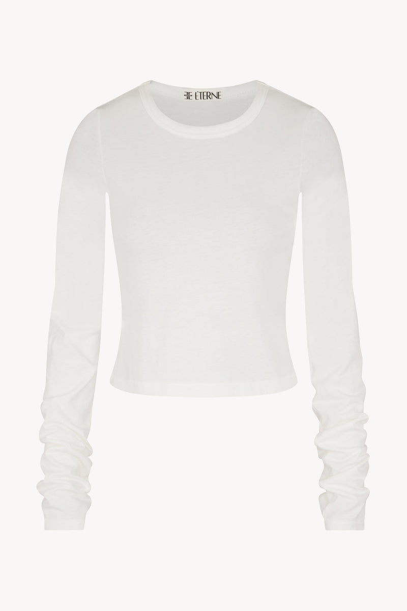 Éterne Long Sleeve Baby Tee-White